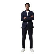 Mulish Costume homme bleu marine en mélange de coton imprimé léopard, col à revers en V, coupe impeccable et texture subtile.