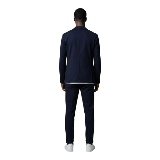Mulish Costume homme bleu marine en coton mélangé imprimé léopard, coupe ajustée, texture subtile et col à revers en V.