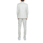 A crisp white tailored suit with a structured blazer and matching trousers made from smooth polyester viscose blend fabric