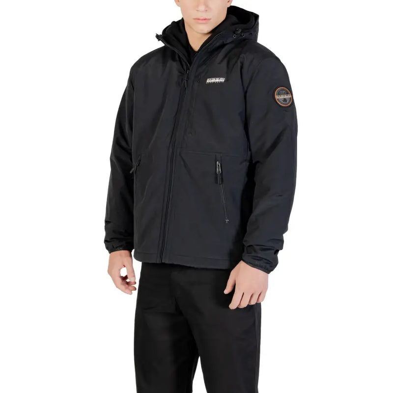 Black waterproof jacket with hood and logo patch, likely from a popular outdoor brand.