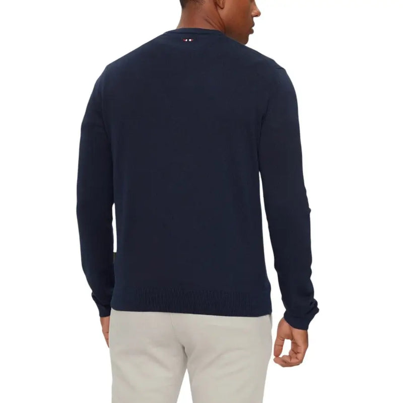 Navy blue crew neck sweater with a subtle logo on the chest.