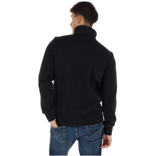 Napapijri Sweat-shirt homme en coton noir à col roulé zippé, manches longues, poignets côtelés et col montant.