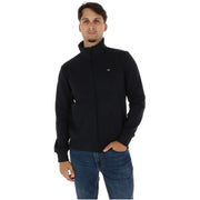 Napapijri Sweat-shirt homme en coton noir à col roulé zippé, veste polaire avec petit logo rouge et blanc sur la poitrine gauche.