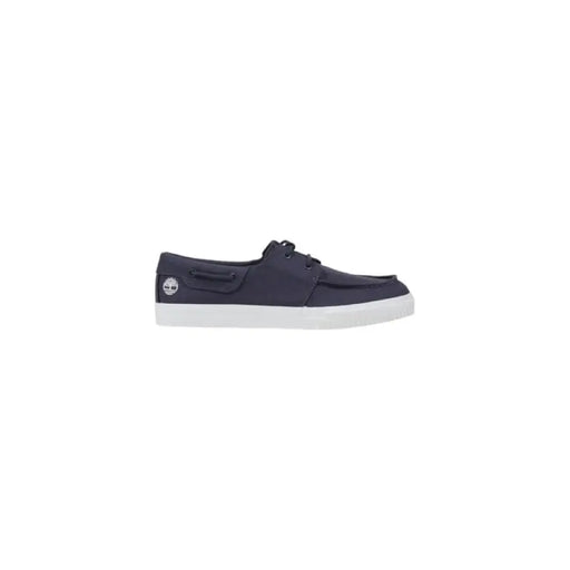 Navy blue boat shoe with white sole displayed in product named Navy Blue Boat Shoe With White Sole