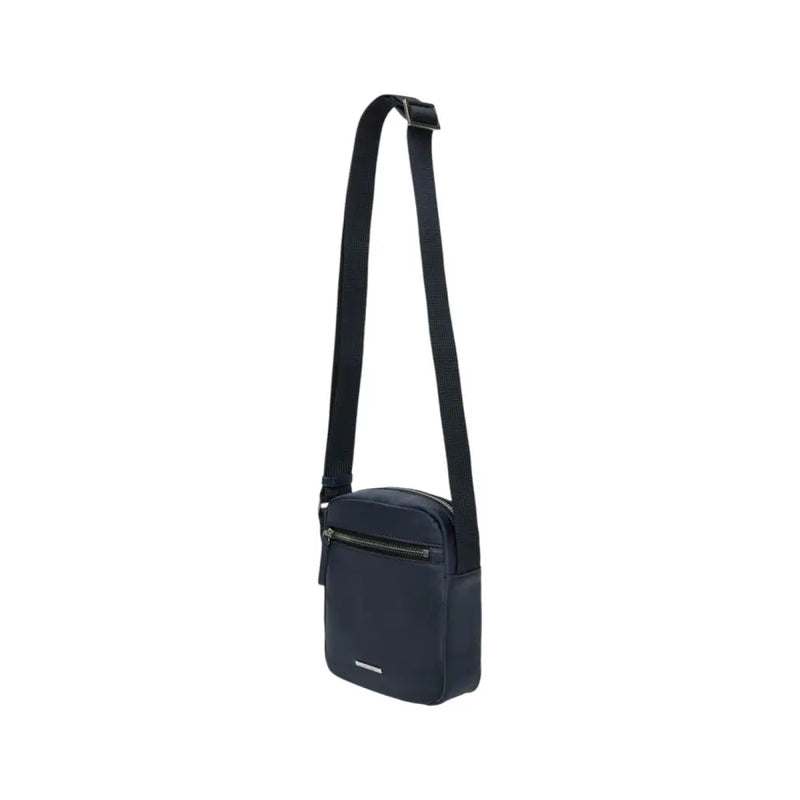 Navy blue crossbody bag displayed for stylish and practical everyday use