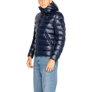 Navy blue hooded quilted puffer jacket with subtle brand logo on the chest for cold weather wear