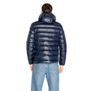 Navy blue quilted puffer jacket with hood designed for warmth and comfort in cold weather conditions