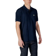 Navy blue Lacoste polo shirt featuring a small embroidered crocodile logo on the left chest for casual wear