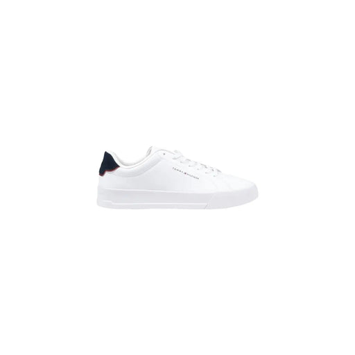 White tommy hilfiger sneaker with navy blue leather heel tab and subtle side branding with white sole
