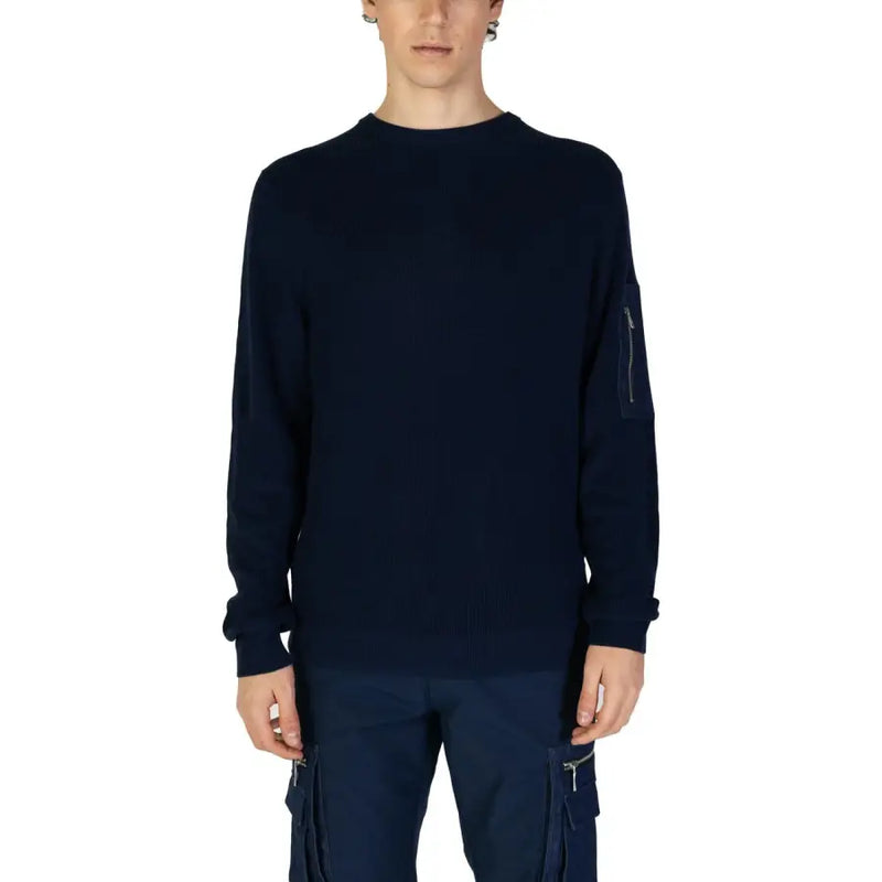 Navy blue long sleeved ribbed knit sweater with zippered pocket on the left sleeve for casual wear