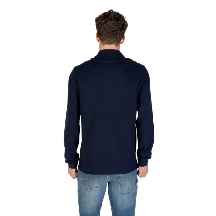 Navy blue long-sleeved polo shirt displayed in the product gallery