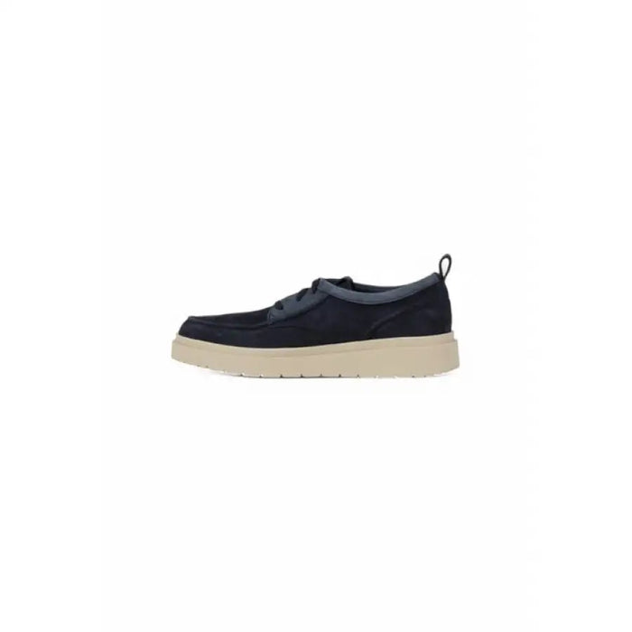 Navy blue suede moccasin shoe displayed for men’s fashion footwear product image