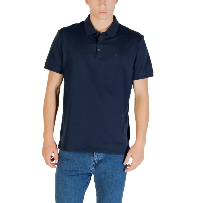 Navy blue short-sleeved polo shirt with subtle embroidered logo on chest made from breathable fabric for casual wear
