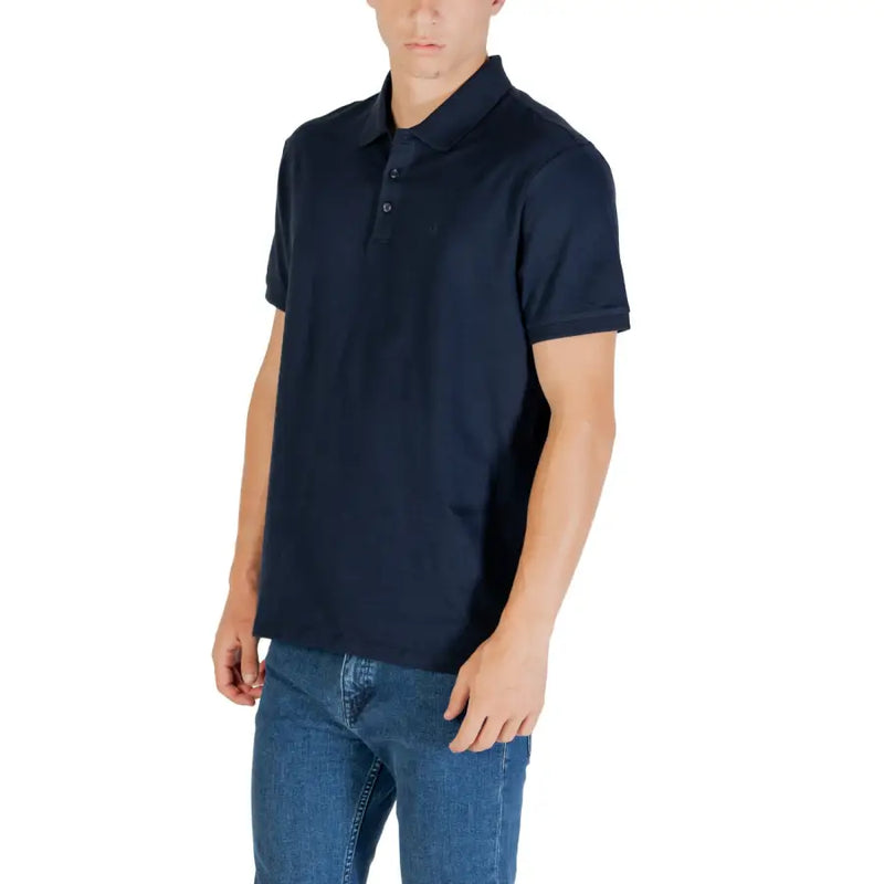 Navy blue polo shirt with short sleeves classic collar and button placket made from breathable cotton fabric