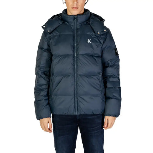 Navy blue hooded puffer jacket displayed in a product image