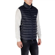 Doudoune sans manches noire matelassée à col montant et fermeture éclair sur le devant Armani Exchange logo sur la poitrine du gilet matelassé bleu marine
