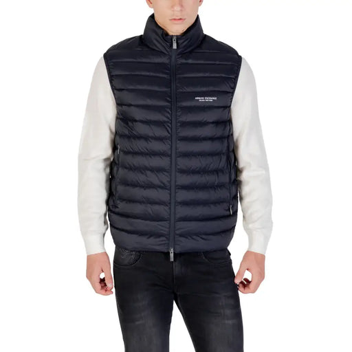 Navy blue quilted puffer vest with high collar front zipper and armani exchange logo on the chest