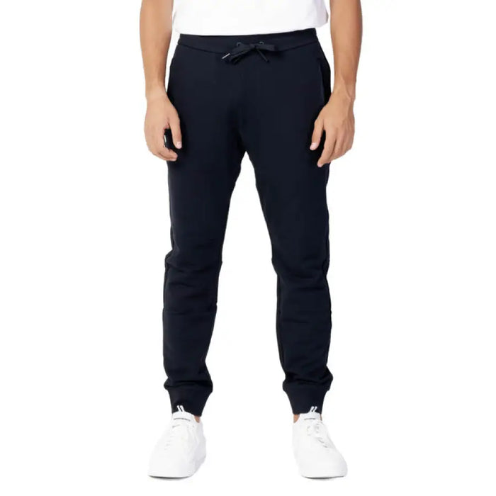 Navy blue drawstring sweatpants from Armani Exchange featuring laces and front pockets