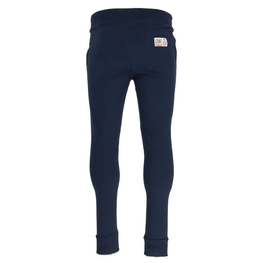 Navy blue cotton sweatpants shown from the back with a white label on the waistband for casual wear