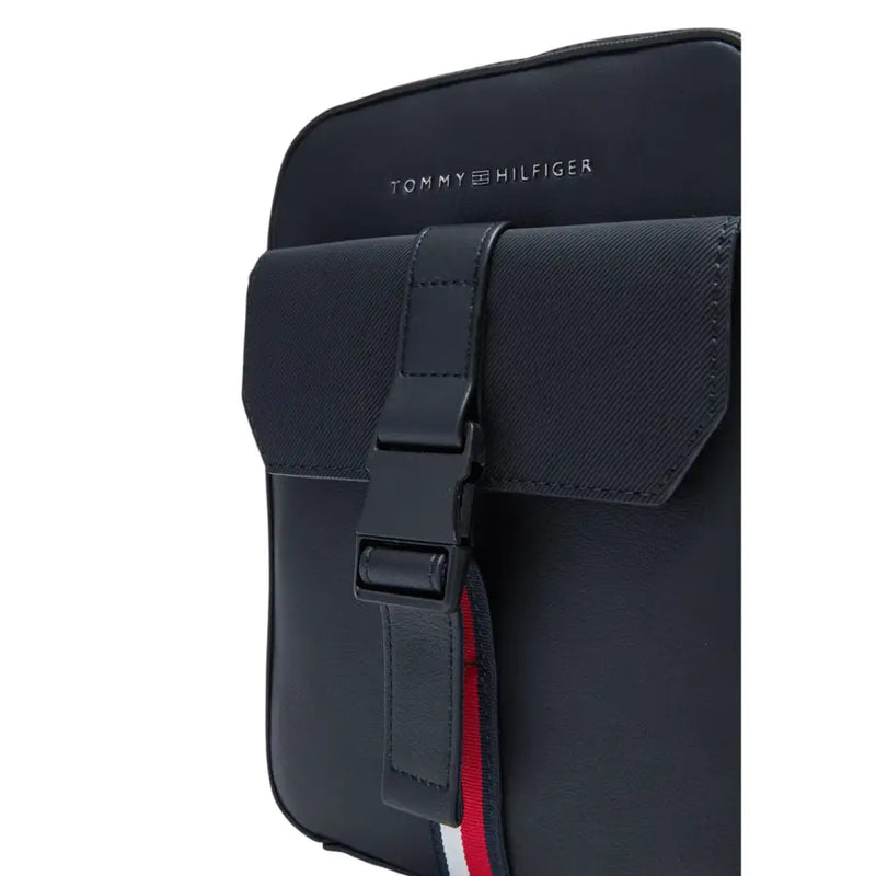 Navy blue Tommy Hilfiger messenger and crossbody bag for men and women