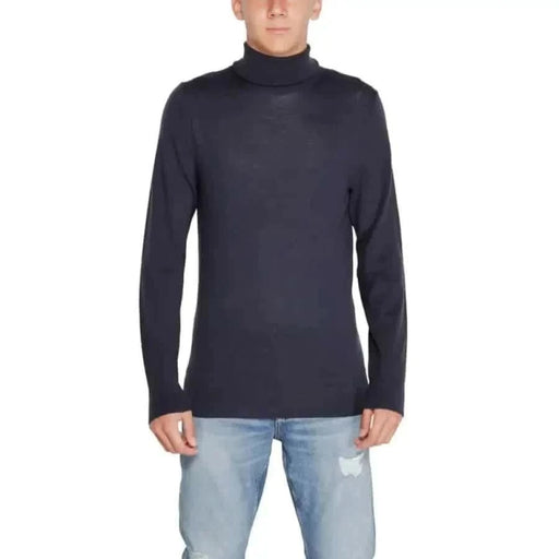pull à col roulé bleu marine de Calvin Klein Collection de tricots pour hommes