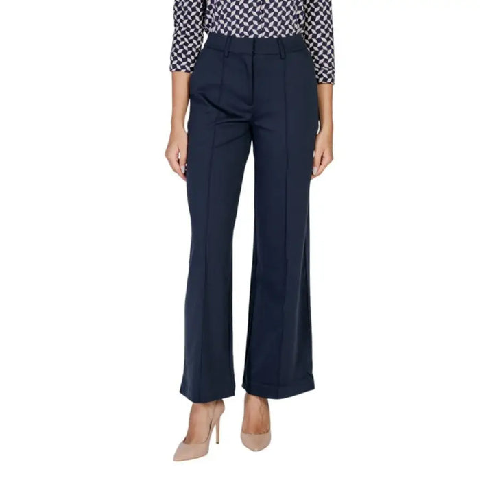 Navy blue wide-leg trousers displayed as part of Black Flared Trousers collection