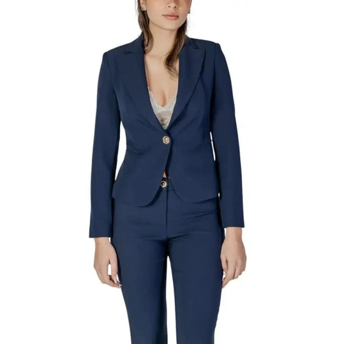 Navy blue women’s suit featuring Rinascimento Women’s Blue Blazer with low-cut V-neck