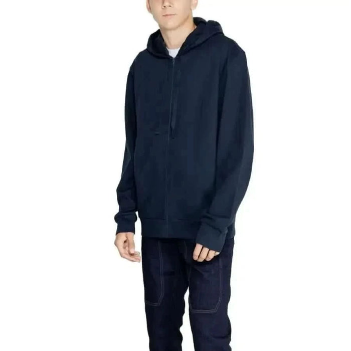 Navy blue zip-up hooded sweatshirt worn by model from Emporio Armani Underwear collection
