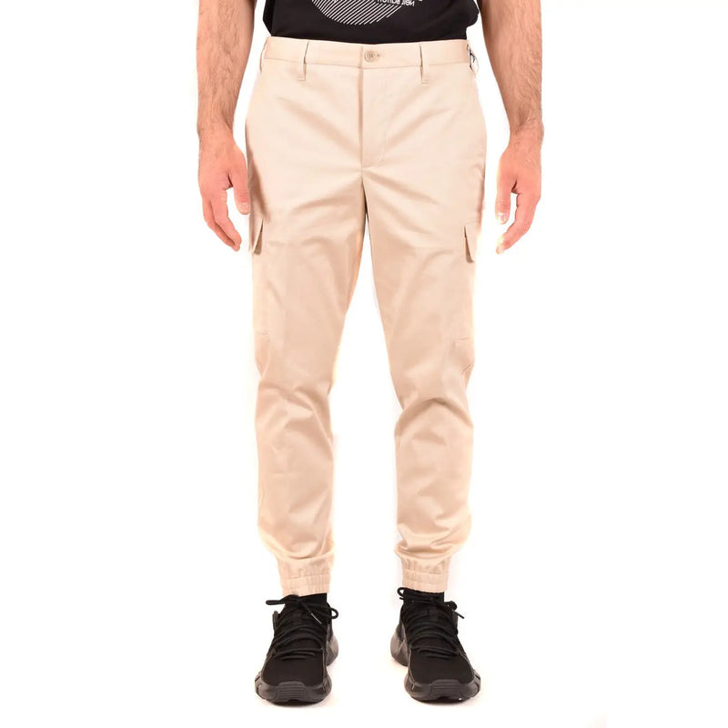Pantalon cargo beige en coton pour homme Neil Barrett, avec poches latérales et ourlets élastiques pour un confort optimal.