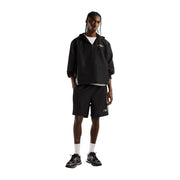 New balance Sweat à capuche zippé noir en polyester pour homme, orné d'un logo blanc discret, assorti à un short noir.