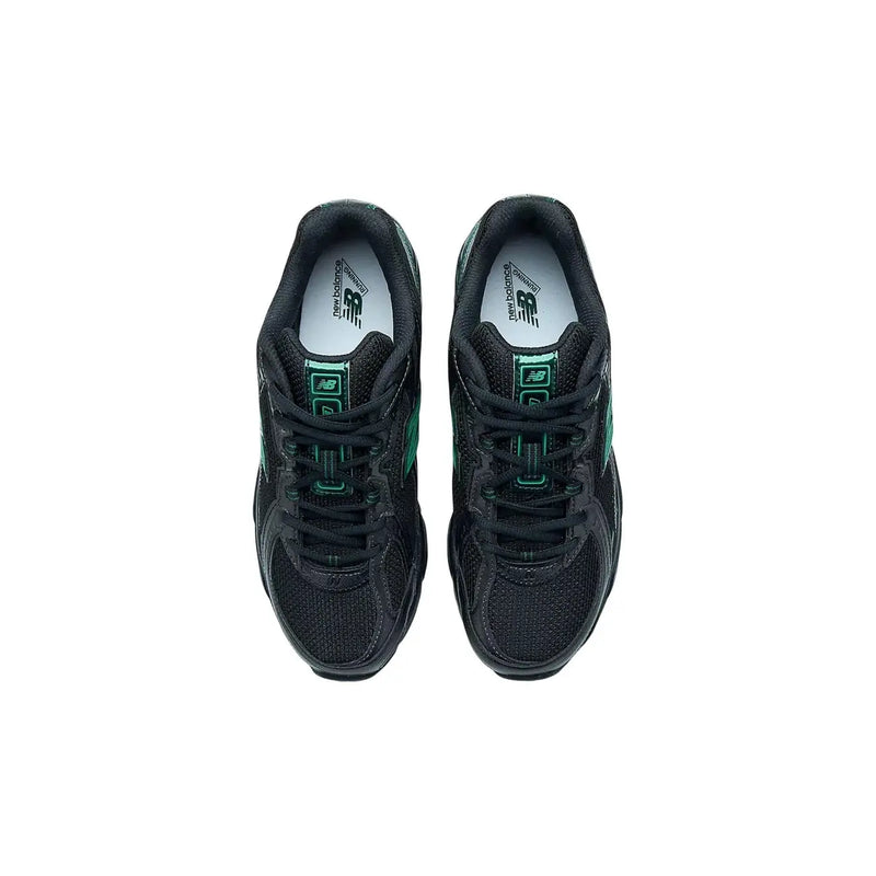 New Balance Baskets noires pour homme en matière synthétique, style classique avec détails turquoise et empeigne en mesh respirant