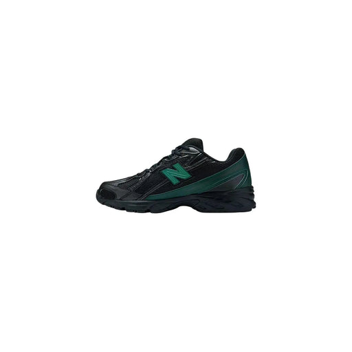 New Balance Baskets noires pour homme, style classique, avec tige en mesh noir et vert et semelle en caoutchouc, idéales pour la course.