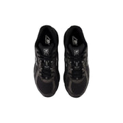 New Balance Baskets homme noires en matière synthétique, modèle slip-on avec empiècements en mesh gris et détails en caoutchouc noir.