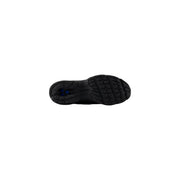 Semelle en caoutchouc noir de new balance Baskets homme à enfiler, semelle texturée et deux petits points bleus près du talon