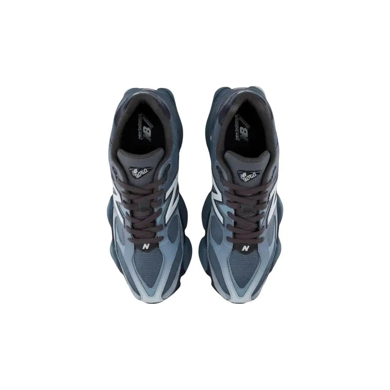 New Balance Baskets homme en daim bleu, chaussures d'automne gris foncé et bleu clair avec un design à plusieurs couches.