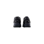 New Balance Baskets noires pour homme avec tige synthétique brillante et semelle en caoutchouc texturé pour la course à pied