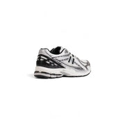 New Balance Baskets homme en cuir blanc M1906R pointure 3,5 avec empiècements noirs, tige en mesh et technologie d'amorti visible