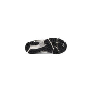 Black and silver asics gel-nimbus 23 running shoe with textured rubber outsole shown with white leather new balance men sneakers size 3.5