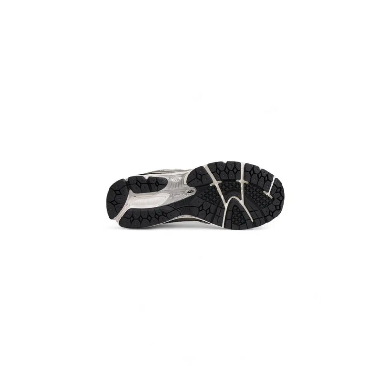 Black and silver asics gel-nimbus 23 running shoe with textured rubber outsole shown with white leather new balance men sneakers size 3.5