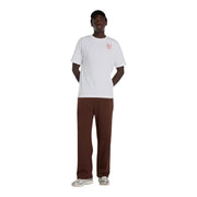Chemise blanche à manches courtes New Balance hommes t-shirt avec un petit motif rouge sur la poitrine gauche pour une tenue décontractée