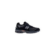 Black new balance running shoe with white accents and mesh upper.