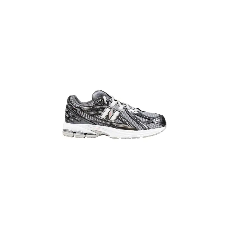 New Balance women’s black synthetic sneakers with gray mesh upper and cushioned sole