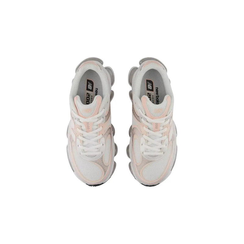 New Balance women grey sneakers in white and blush pink textile and synthetic with a chunky layered design