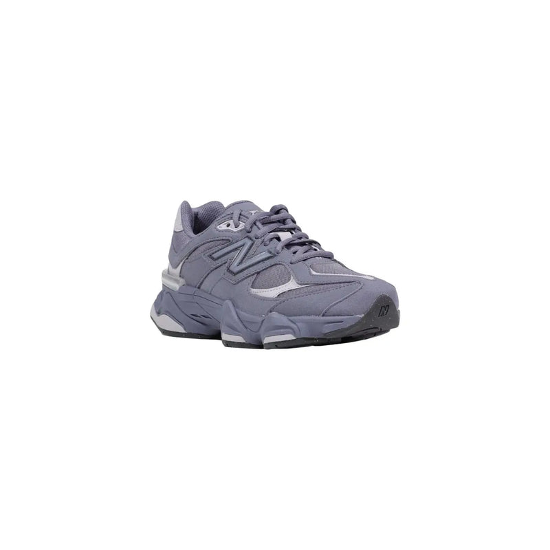 New Balance women grey suede sneakers featuring a chunky layered sole and breathable mesh upper