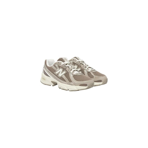 New balance Baskets grises pour femme, modèle beige 530, tige en mesh et daim, lacets blancs et semelle épaisse.