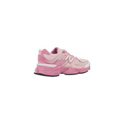 New balance women pink suede sneakers featuring mesh and synthetic overlays in a pink 990v5 sneaker design