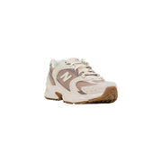 Cream New Balance 530 sneaker with pink suede, mesh overlays, tan sole