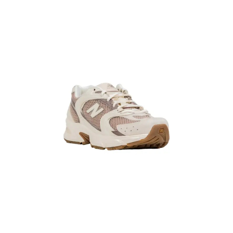 Cream New Balance 530 sneaker with pink suede, mesh overlays, tan sole
