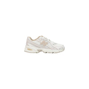 White new balance 520 women running sneaker with beige synthetic accents and breathable mesh upper for sporty use