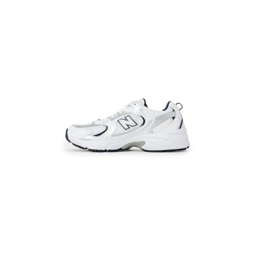 New Balance 530 white women’s sneakers with black and silver accents